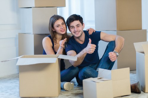 Professional movers loading items into a truck