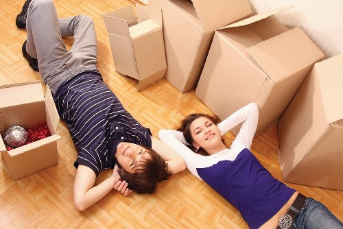 Experts packing and organizing boxes for relocation